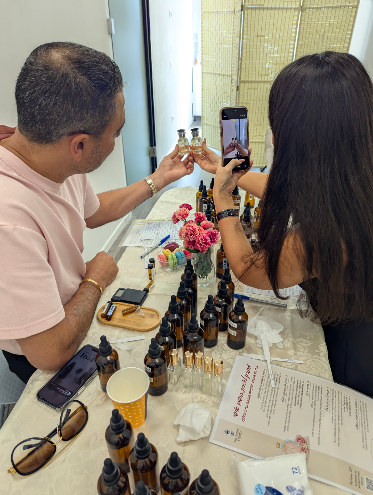 A real couple capturing the perfumes they made together