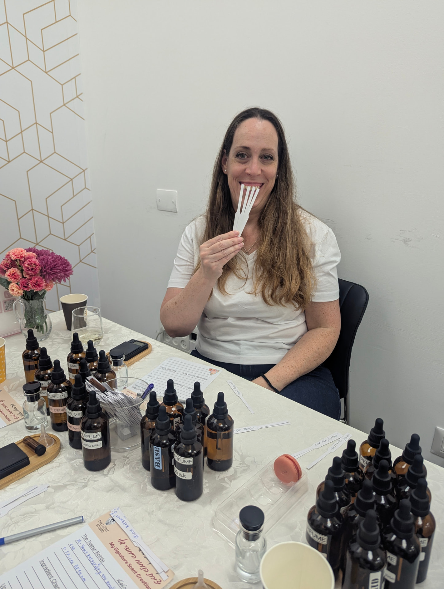A guest discovering fragrance notes during the scent challenge